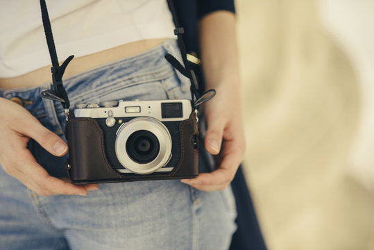 Girl with a vintage camera