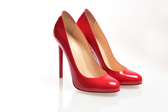 Red elegant shoes on a white background