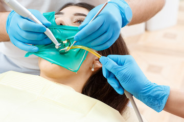Professional dentist working at his clinic