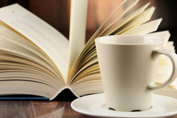 Composition with books and cup of coffee