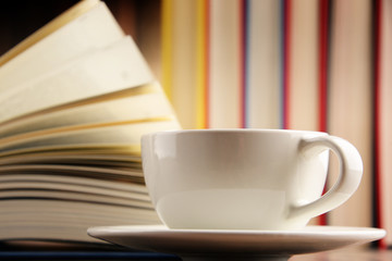 Composition with books and cup of coffee