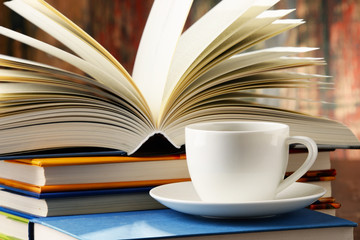 Composition with books and cup of coffee