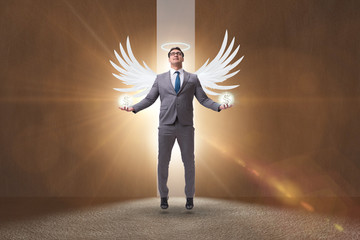 Obraz premium Angel investor concept with businessman with wings