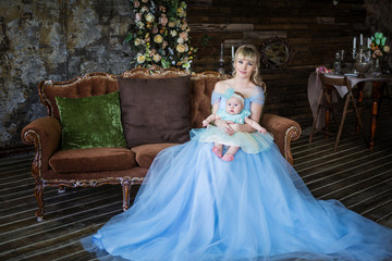 Fototapeta premium Mom and little daughter in beautiful dresses