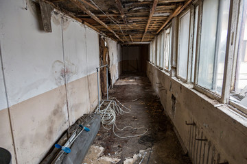 Ruined abandoned room in a house requiring major repairs