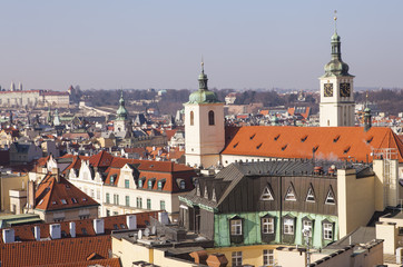 Naklejka na ściany i meble Prague roofs and domes against the blue sky, Prague, Czech Republic, Europe 