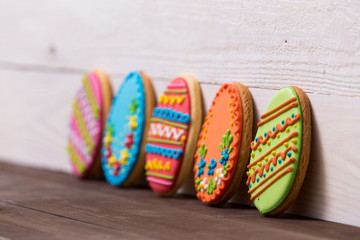 Delicious Easter cookies on wooden background. Easter concept.