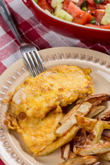 Served fried chicken white meat with potatoes