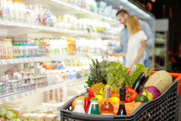 Lovely young couple at the supermarket