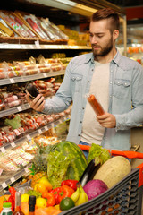 Handsome male at the groceries store