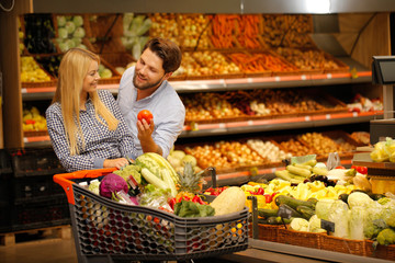 Beautiful couple at the local groceries store