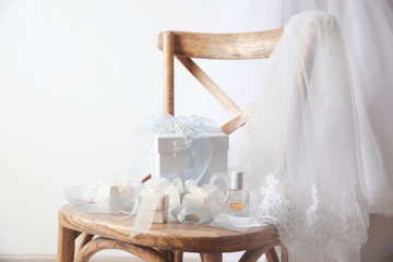 Wooden chair with gift boxes for wedding day
