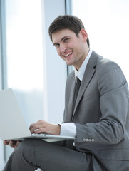 Handsome smiling confident business man portrait