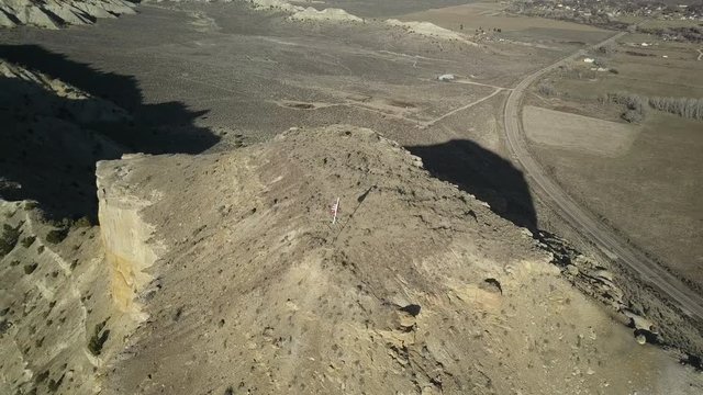 Aerial USA Fag mountain plateau southwest Utah desert. Grand Staircase Escalante National Monument 1.9 million acres of geological landscape. Towering sandstone mountains and spires.