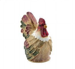 Metal statuette of a rooster on a white background. Isolated