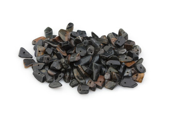 Natural stones crumb for ornaments on a white background