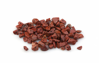 Natural stones crumb for ornaments on a white background