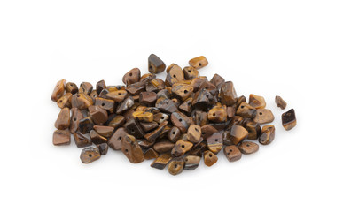 Natural stones crumb tiger's eye for decoration on a white background. Isolated