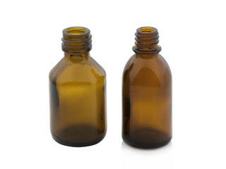 Vial of medicine without a lid on a white background