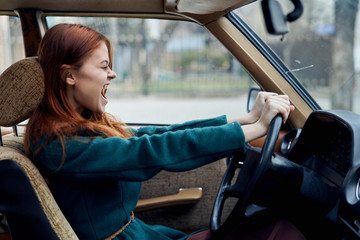 woman car steering wheel emotion adrenaline