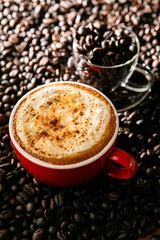 A cup of cappuccino on coffee beans, 카푸치노