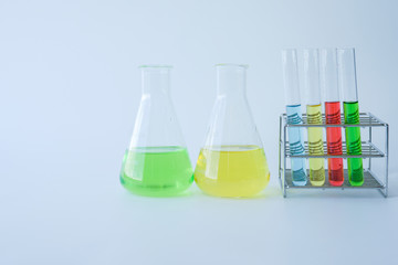 Laboratory glassware with colorful liquids for chemical experimental in laboratory, analysis research, science background