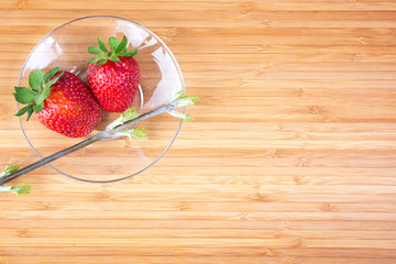 fresh strawberries on wooden table