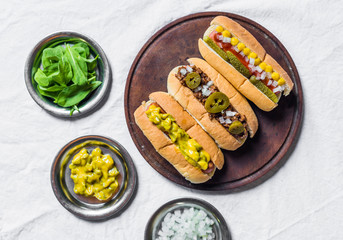 Selection of classic hot dogs against white background