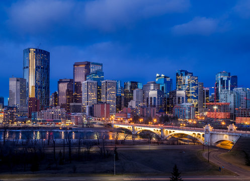 Calgary's skyline with the Bow River in the foreground.