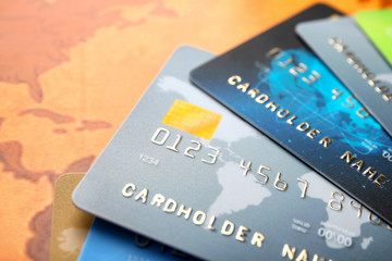 Credit cards on world map background