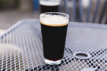 Full Pint Glass with Dark Beer
