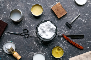 male hairdressing concept with barbershop tools on gray background top view