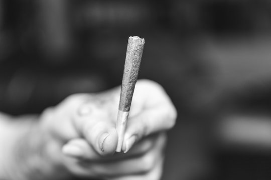 Joint in Woman's Hand