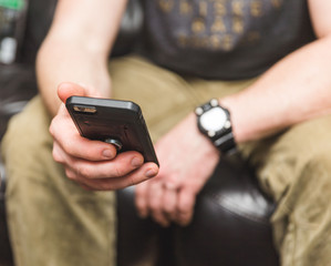 Cell Phone in Man's Hand