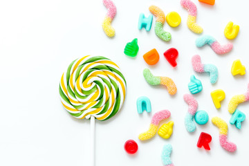 lollipop design with sugar candys on white background top view mockup