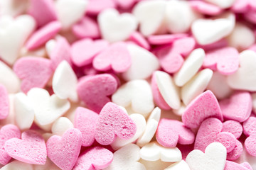 Colorful candies on abstract texture background pattern