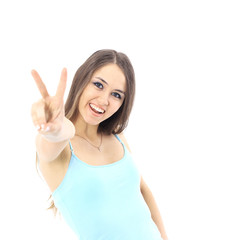 Beautiful young woman posing and showing two thumbs up