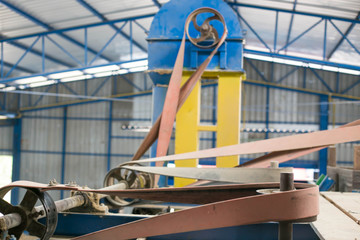 Some part of rice mill machine during working.