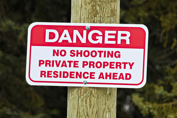 No shooting sign indicating private residence ahead
