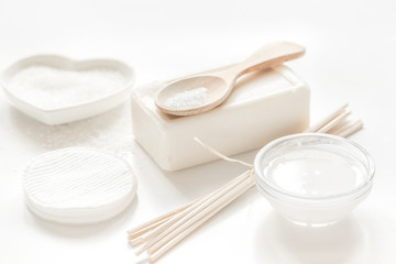 body care concept with white set of cosmetics woman desk top view