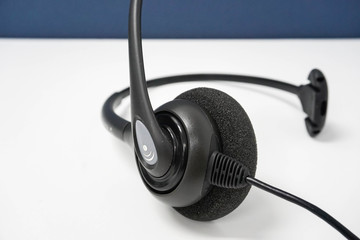 close up black call center headset for customer service