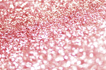 pink bokeh texture. Festive glitter background with defocused lights