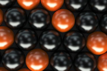 Pattern of black and orange spheres