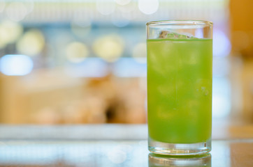 Ice green tea and blur background