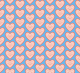 white pink heart pattern on blue background