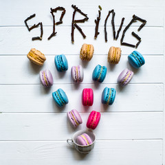Spring macaron in a cup on a white background