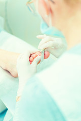 Naklejka premium Pedicure in process