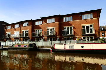 new houses apartment alongside canal