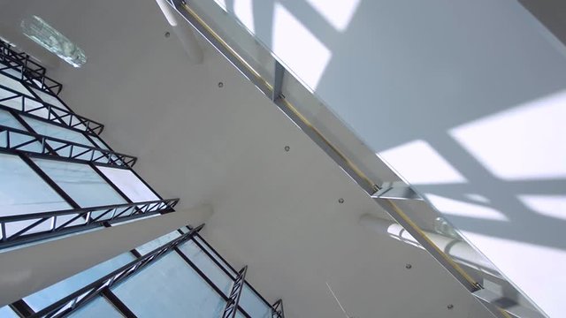 Modern architecture detail - glass ceiling in the office building. Slider / dolly.