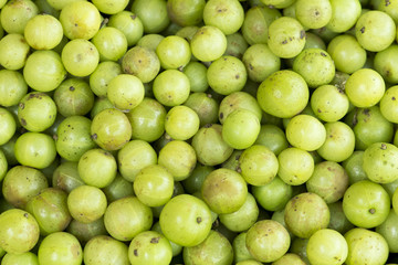 background with fresh Indian gooseberry in market
